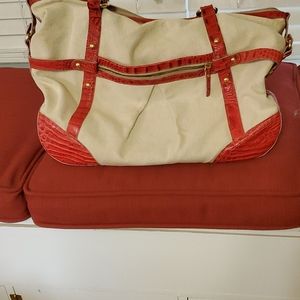 Brahmin canvas and leather tote. Has a few barely visible marks on it. See pic.